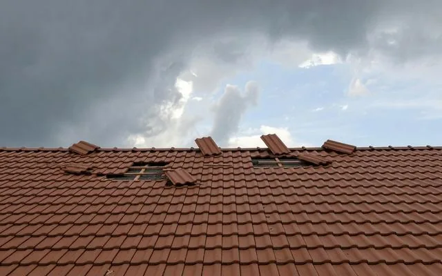 Ridge capping displaced by strong wind